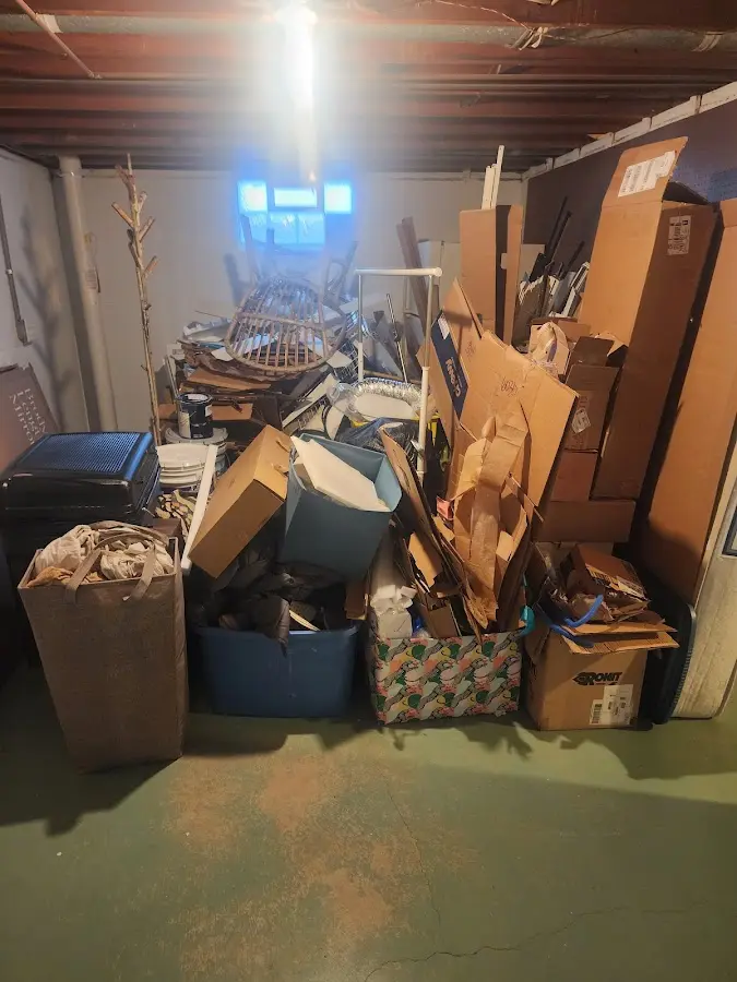 Roll-off dumpster container at job site for 6 Yard Dumpster Rental in Belville